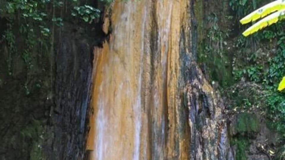 Diamond Falls changes colors due to the volcano