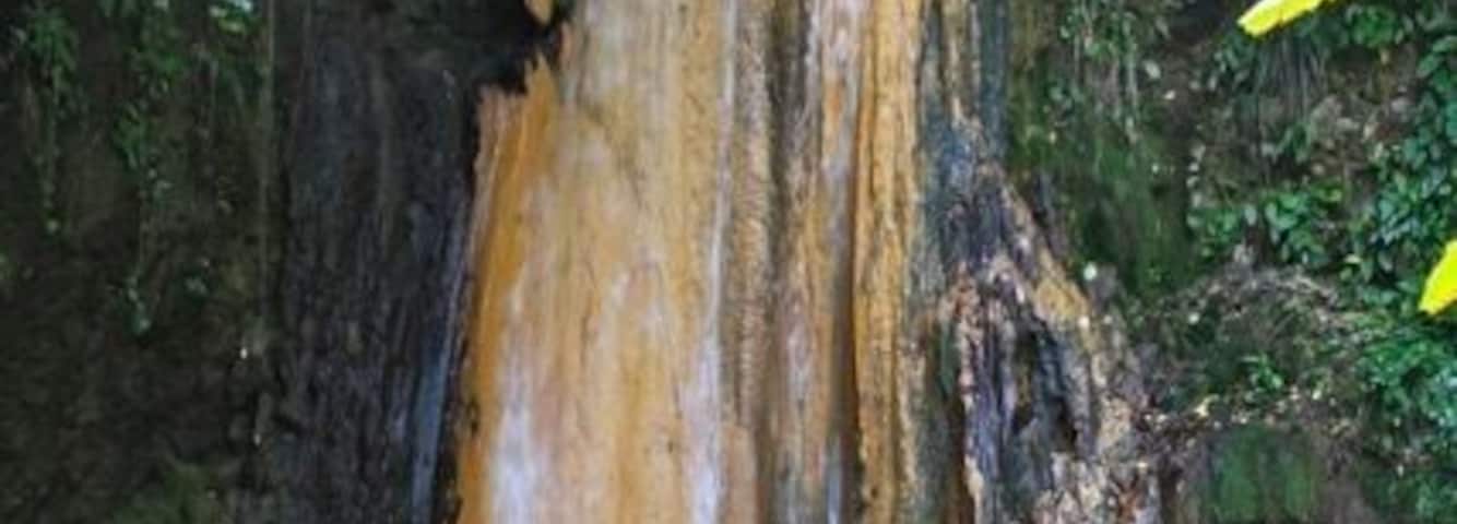 Diamond Falls changes colors due to the volcano