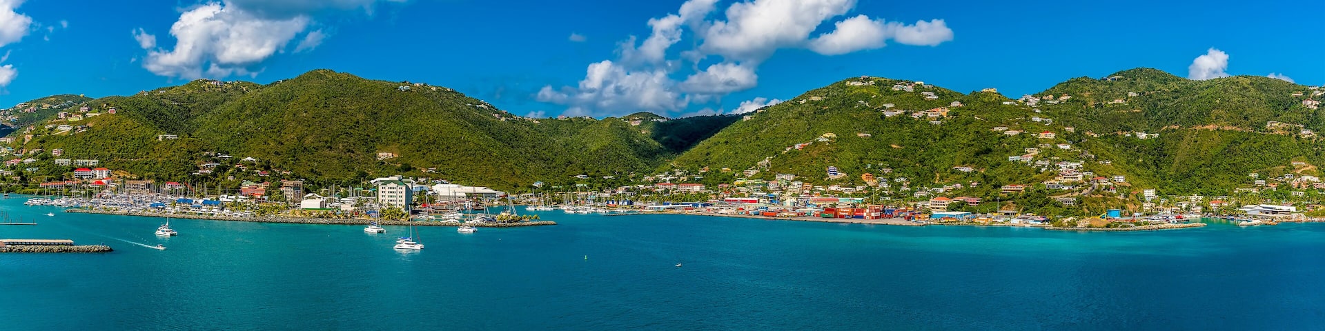 The wooded hilltops above Road Town dotted with colourful houses in Tortola