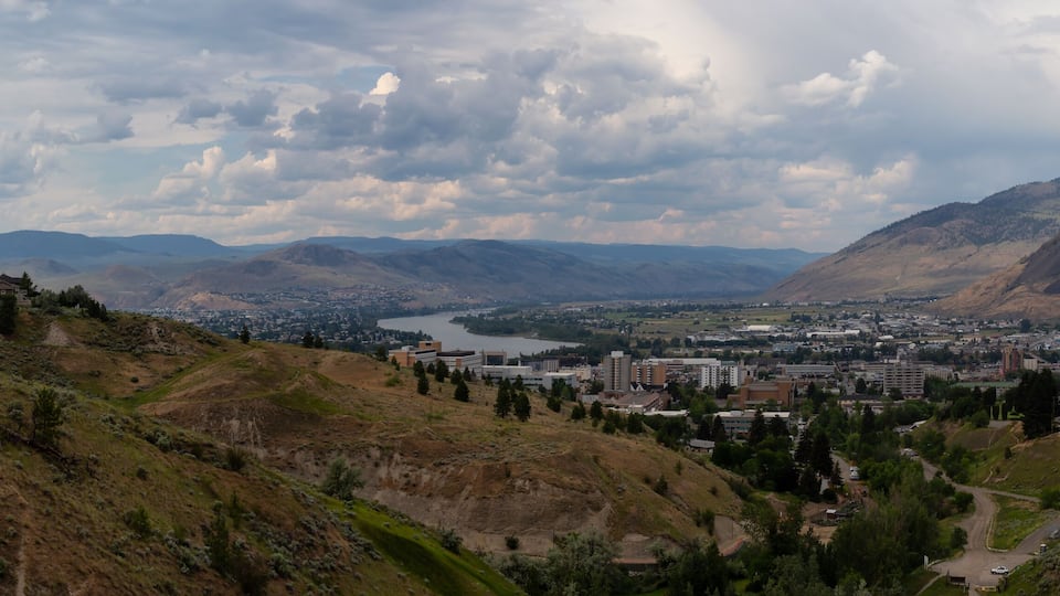 Aerial panoramic view of Kamloops City during a cloudy summer day. Located in Interior BC, Canada.