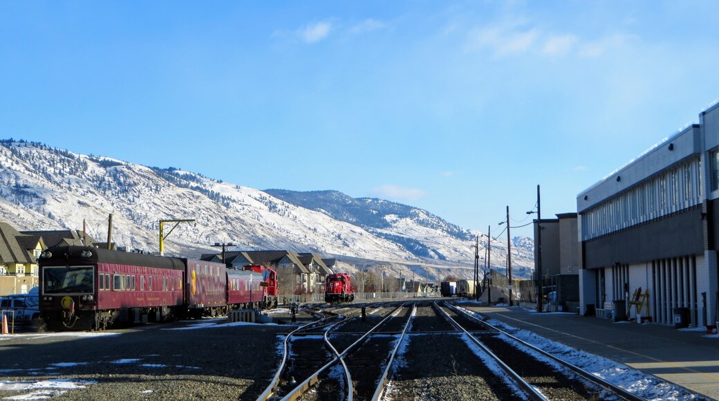 The Canadian Pacific Railway train stopped in downtown Kamloops, British Columbia, Canada on a beautiful winters day with sunshine and blue sky.