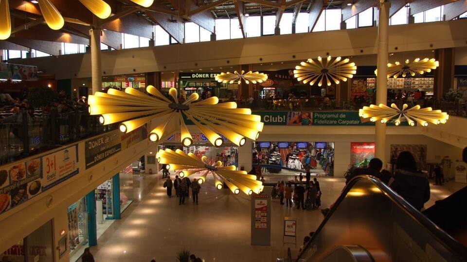 The 105 million Euro investment in Iulius Mall Timisoara brought over 330 national and international brands to the mall ensured 2,500 underground and overground parking places, a food court with a capacity of 1,700 people, Auchan hypermarket, Cinema City multiplex cinema with 7 auditoriums, bowling and billiard club, seasonal ice skating rink, pool, play area for children, casino, cafés and restaurants.
#architecture