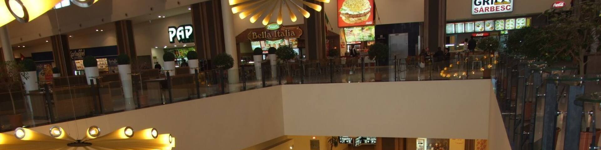 Opened in 2005, Iulius Mall Timişoara is the largest mall outside of the Capital City of Romania.
Iulius Mall Timişoara impresses through its original architecture, the brand diversity and the countless leisure and entertainment opportunities.
#architecture