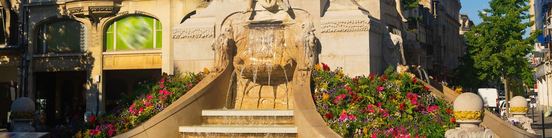 Beautiful sky and fountain Sube with golden angel at Reims central Erlon square in city center, Reims. France