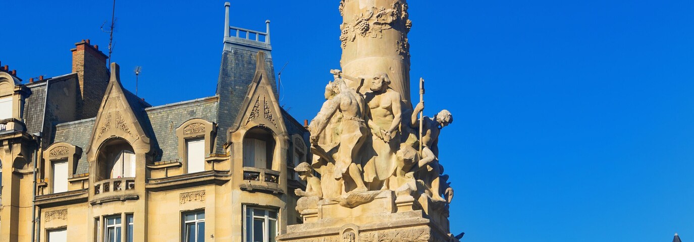 Beautiful sky and fountain Sube with golden angel at Reims central Erlon square in city center, Reims. France
