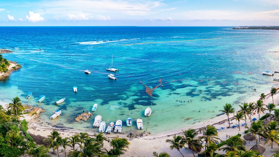 Aerial view of the Akumal Bay in Quintana Roo, Mexico. Caribbean Sea, coral reef, top view. Beautiful tropical paradise beach