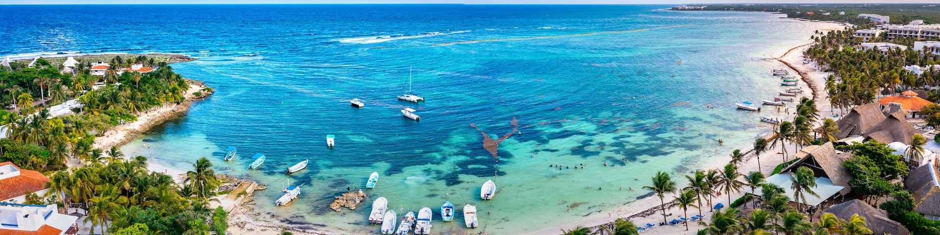 Aerial view of the Akumal Bay in Quintana Roo, Mexico. Caribbean Sea, coral reef, top view. Beautiful tropical paradise beach
