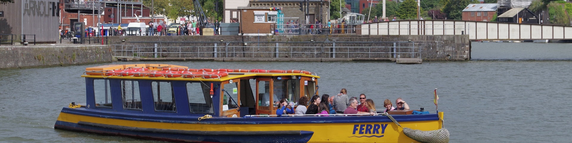 A ferry on the waters of Bristol Docks, coming out of St Augustine's Reach and heading west.