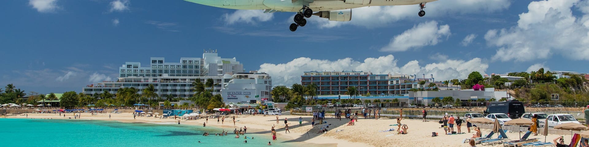 Maho featuring a beach, general coastal views and a coastal town