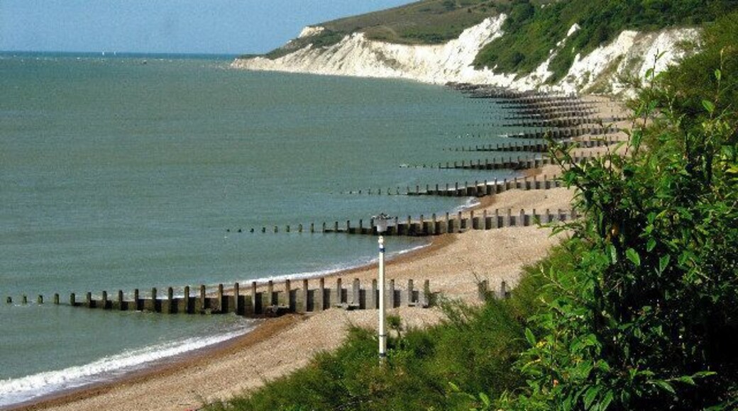Eastbourne - Western Parade. The view which is taken from the west end of the promenade at Eastbourne looks south west along the coast to the promontory which hides Beachy Head from view.