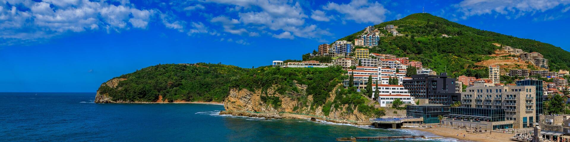 Aerial view of Budva Old Town from the Citadel with Richard’s Head beach and Adriatic Sea in Montenegro, Balkans..