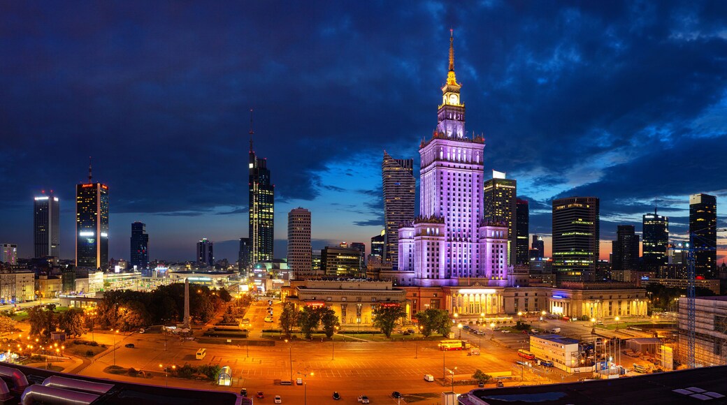 Evening cityscape with city lights - view of the Warsaw downtown and The Palace of Culture and Science. Warsaw. Poland