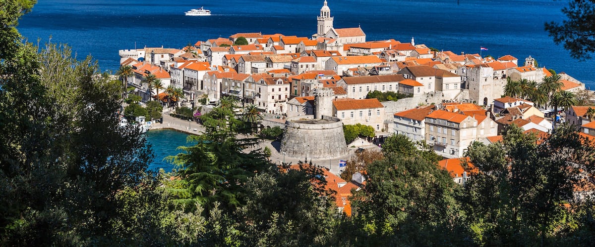 Framing Korcula old town in the trees