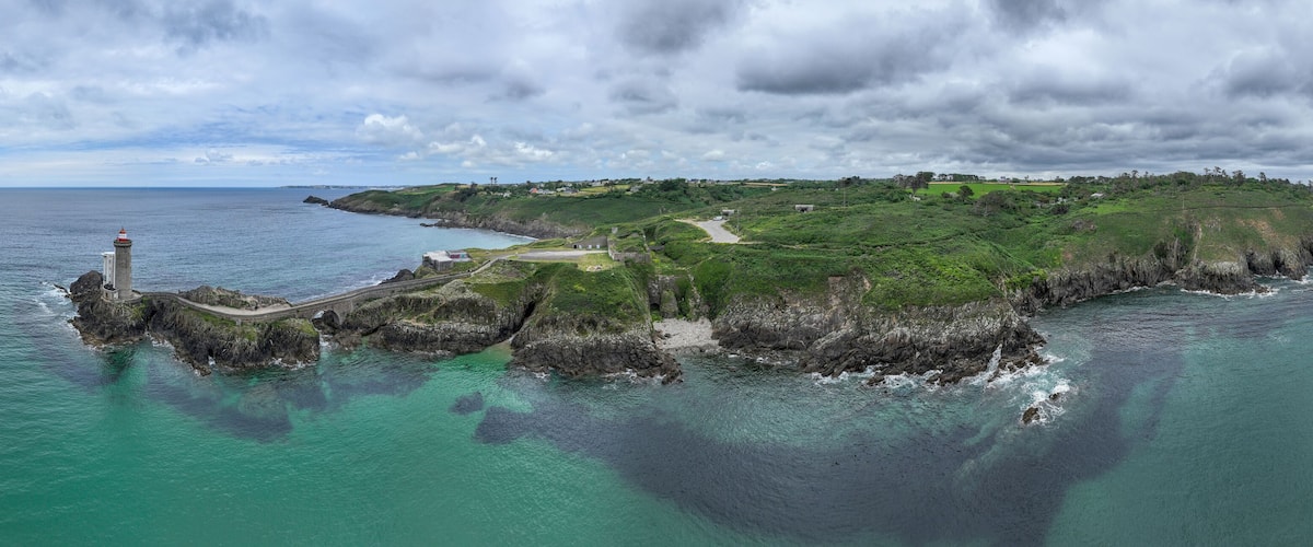 Aerial view of the Petit Minou Lighthouse is a lighthouse in the roadstead of Brest, standing in front of the Fort du Petit Minou, in the commune of Plouzané. Coastline. France