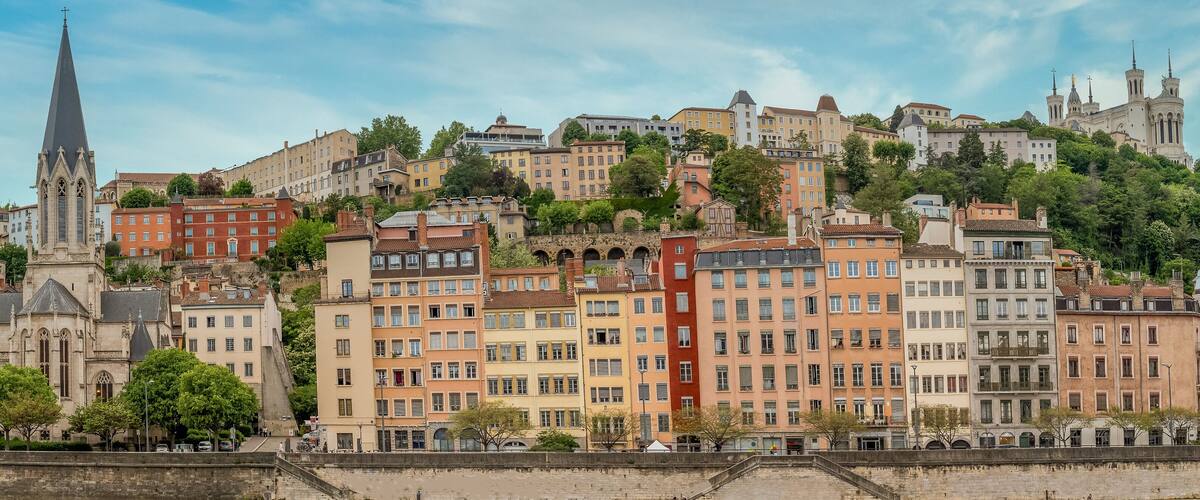 Colorful houses of Vieux Lyon on the River Saône quayside, overlooked by Renaissance-era mansions withmedieval Cathédrale Saint-Jean-Baptiste