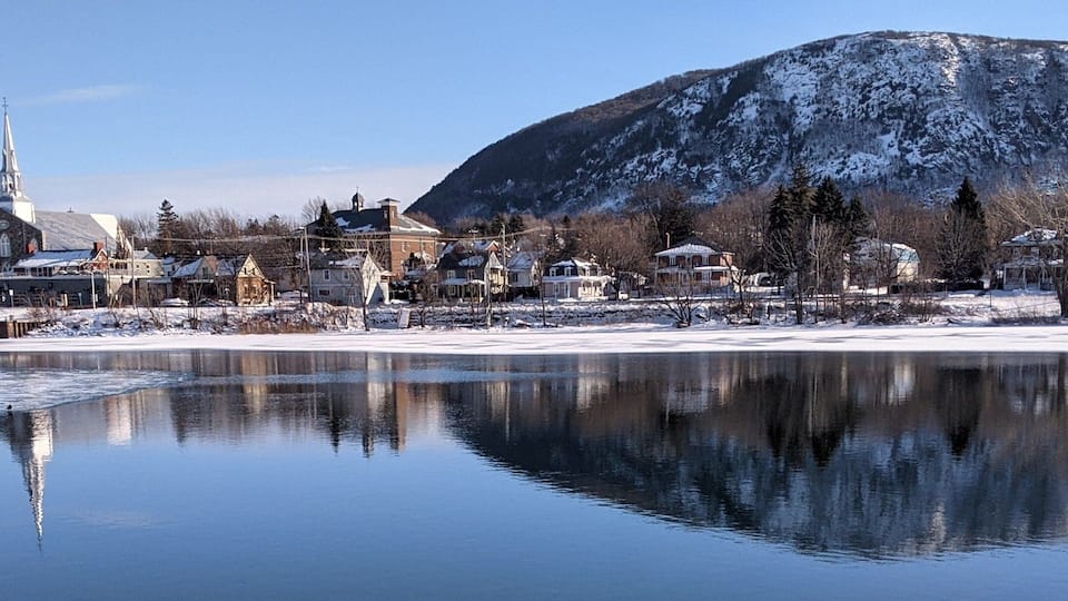 Reflection of Mont St Hilaire on Richelieu River