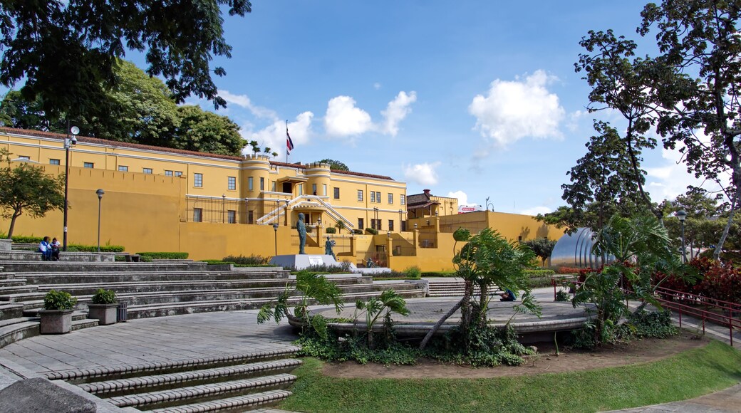 National Museum of Costa Rica in an old military barracks, with the Costa Rican flag flying above it, in downtown San Jose, Costa Rica