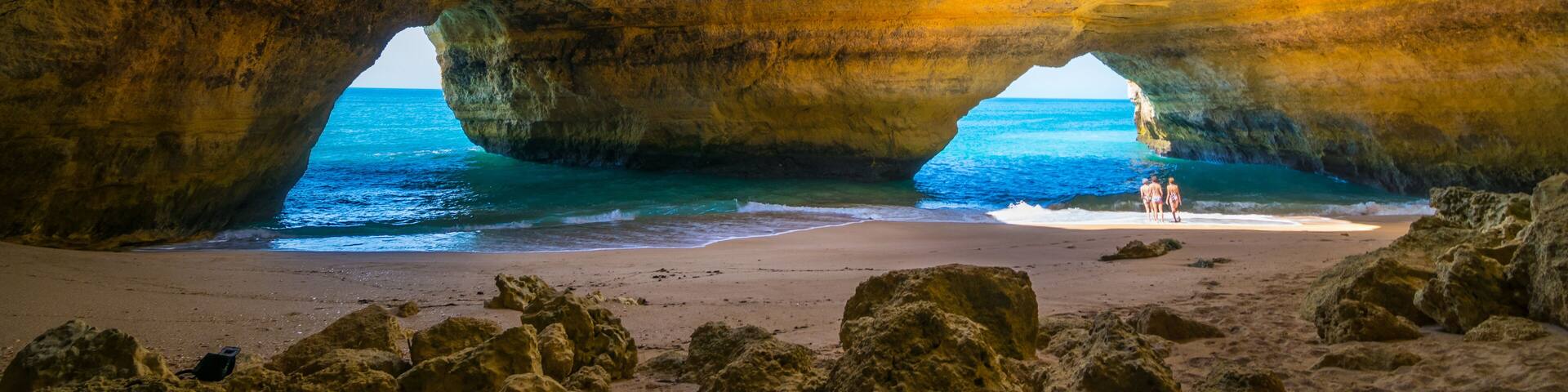 Carvoeiro, Portugal - June, 10, 2015 - Tourists enjoy a beautiful day to know the Benagil Cave in Algarve, one of the most wonderful caves in the world.