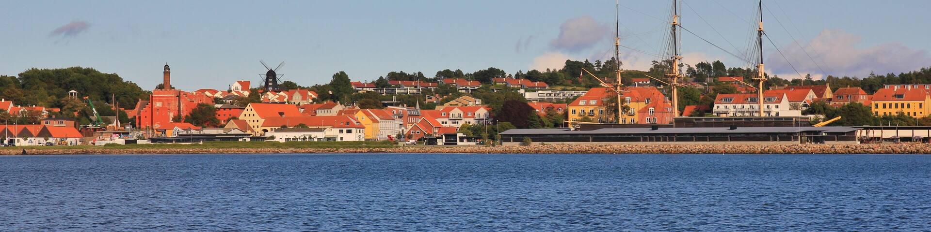 Ebeltoft and masts of Fregatten Jylland.