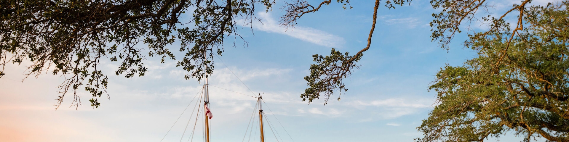 The sailboat Joshua returns to port after a sunset sail from The Grand Hotel Golf Resort and Spa in Point Clear Alabama