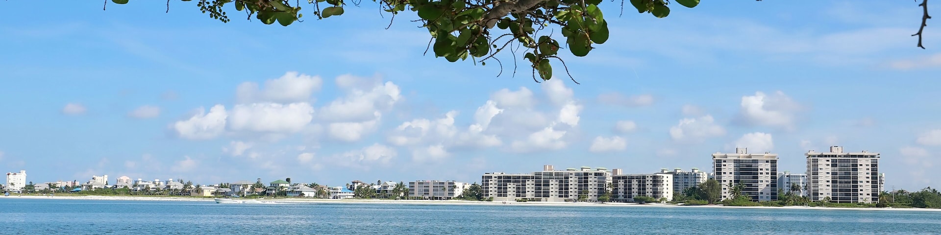 Fort Myers Beach skyline as seen from Big Carlos Pass, Florida, USA.