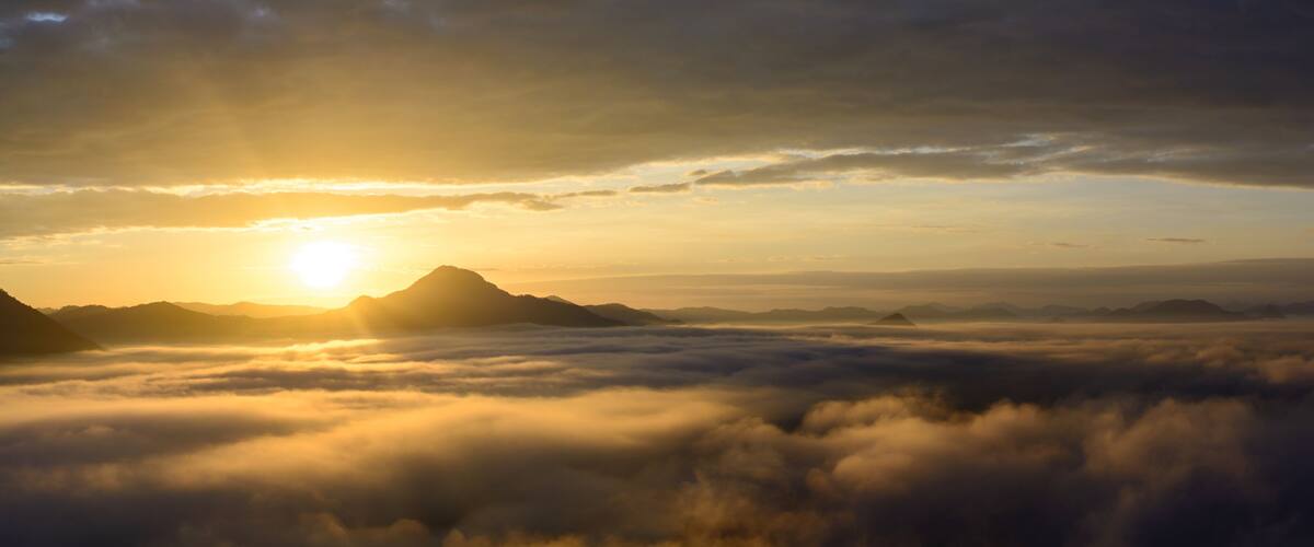 Fog on the mountain at sunset at phu thok chiang khan loei provi
