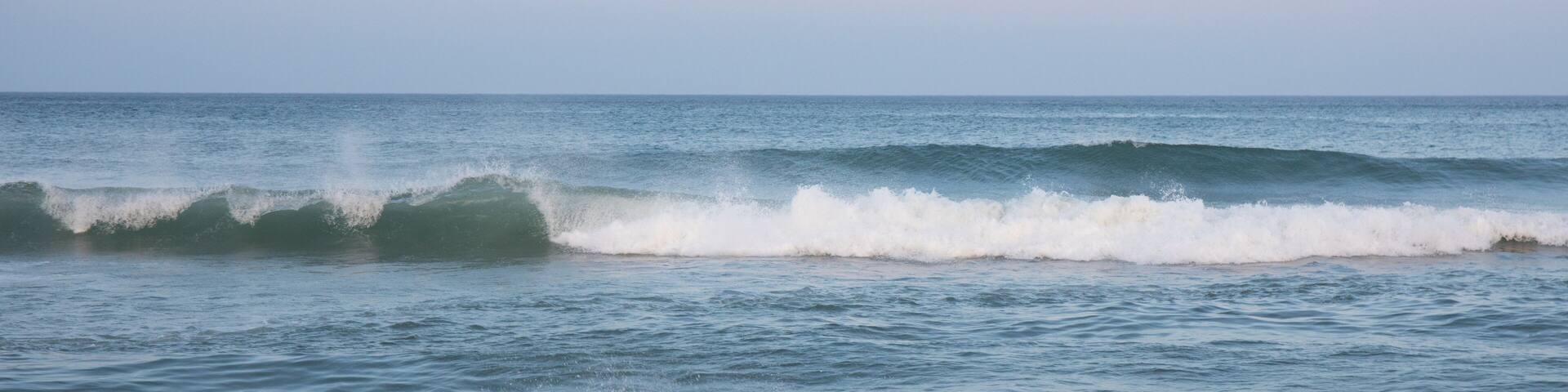 Waves crashing in the ocean.