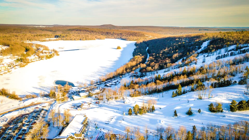 Aerial of Snow-covered Poconos Mountain