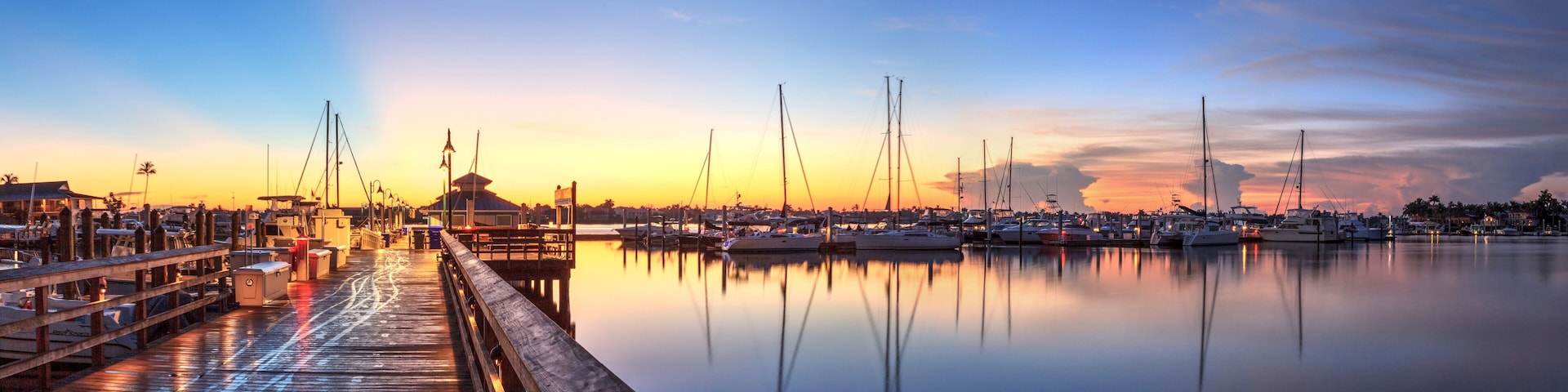 Sunrise over Naples City Dock in Naples, Florida.