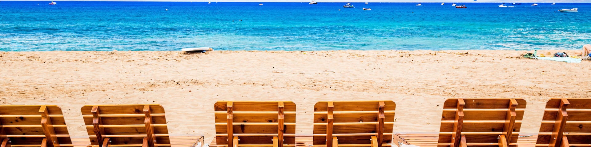 Beach sunbed on Kaanapali Beach, Maui, Hawaii. With three miles of white sand and crystal clear water, no wonder why Kaanapali Beach was once named America Best Beach