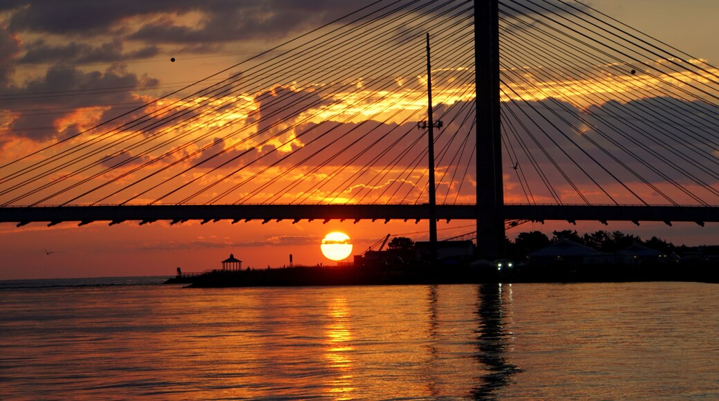 Silhouette of the Indian River Bridge during sunrise near Indian River Inlet, Delaware, U.S.A