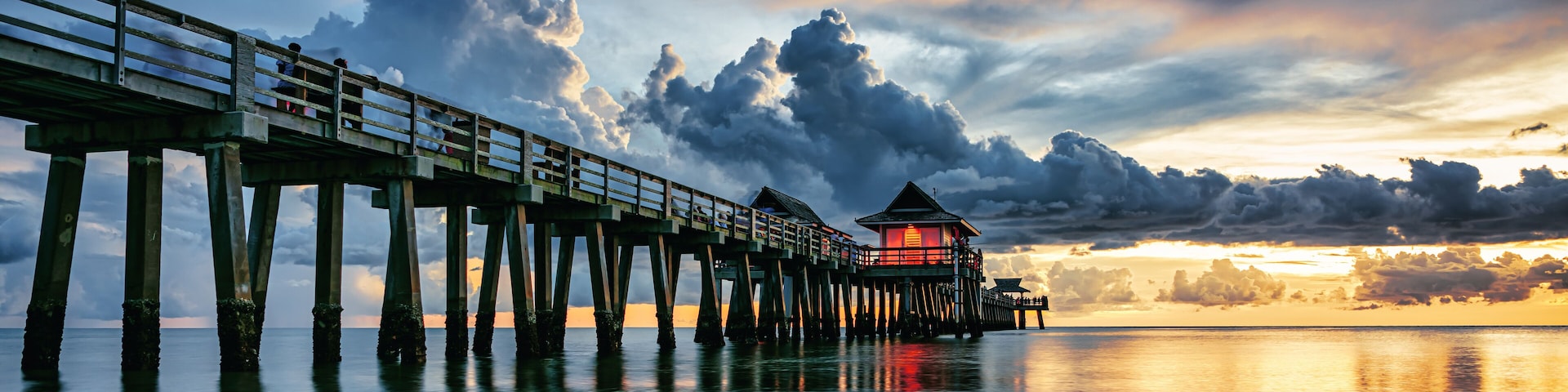Sunset over the fishing pier and Gulf of Mexico in Naples, Florida. Art collection