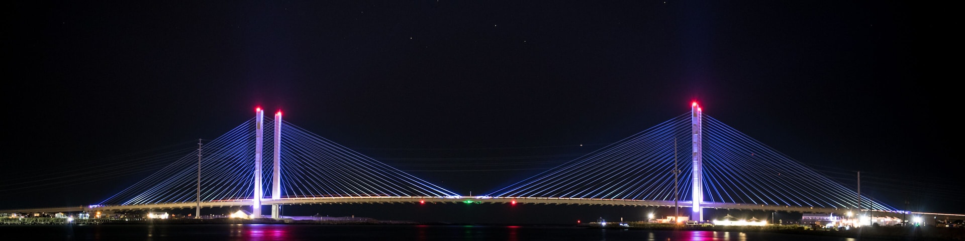 The Indian River Inlet Bridge on the last day of Summer 2020. If you look closely there is a small shooting star between the bridge spans. A cable-stayed bridge located in Sussex County, Delaware.