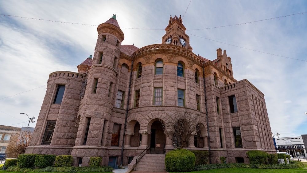 Wise County, TX Courthouse with blue sky in background