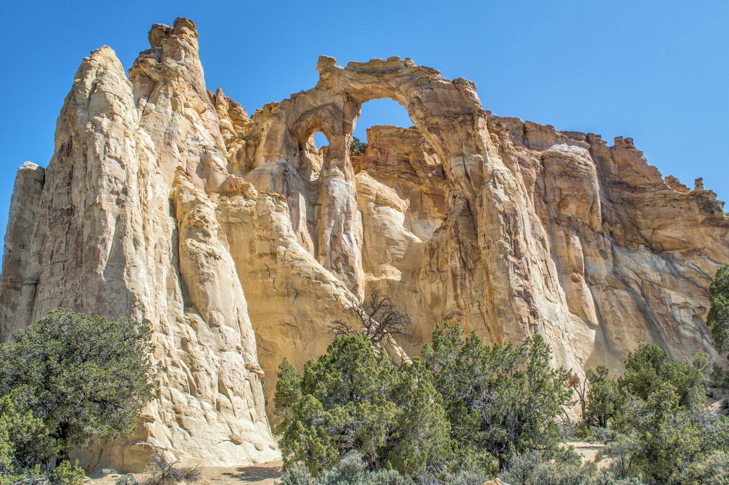 Located within the Grand Staircase National Monument, Grosvenor Arch is a unique sandstone double arch named for a former president of the National Geographic Society. It can only be accessed via Road 400, which is a long dirt road that is often impassable, particularly during rainy weather. Luckily for us it had been dry for several days prior to our visit, but the road is poorly maintained and I wouldn't recommend it unless you have a 4WD vehicle. #utah #grandstaircase #grosvenorarch