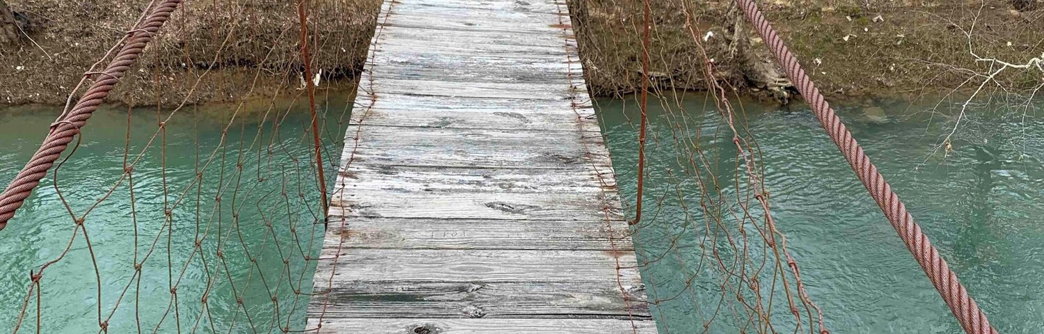 Crossing the swinging bridge in Clay County Kentucky. Clay County is the Land of Swinging Bridges. #river #bridges #outdoors