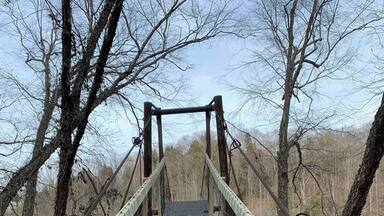 Crossing the swinging bridge in Clay County Kentucky. Clay County is the Land of Swinging Bridges. #river #bridges #outdoors