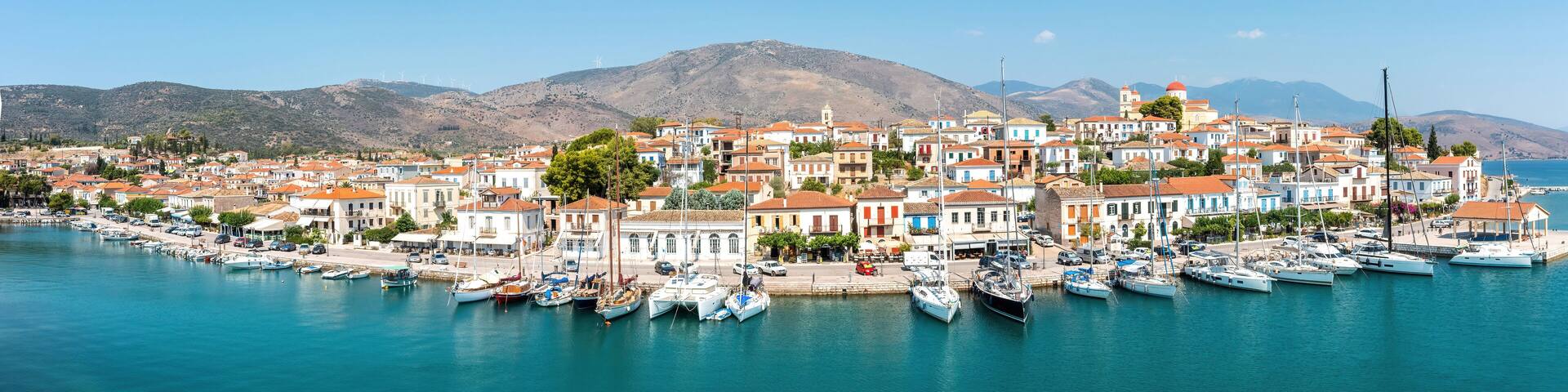 Galaxidi Greece from above, aerial drone view. Traditional town sunny day.