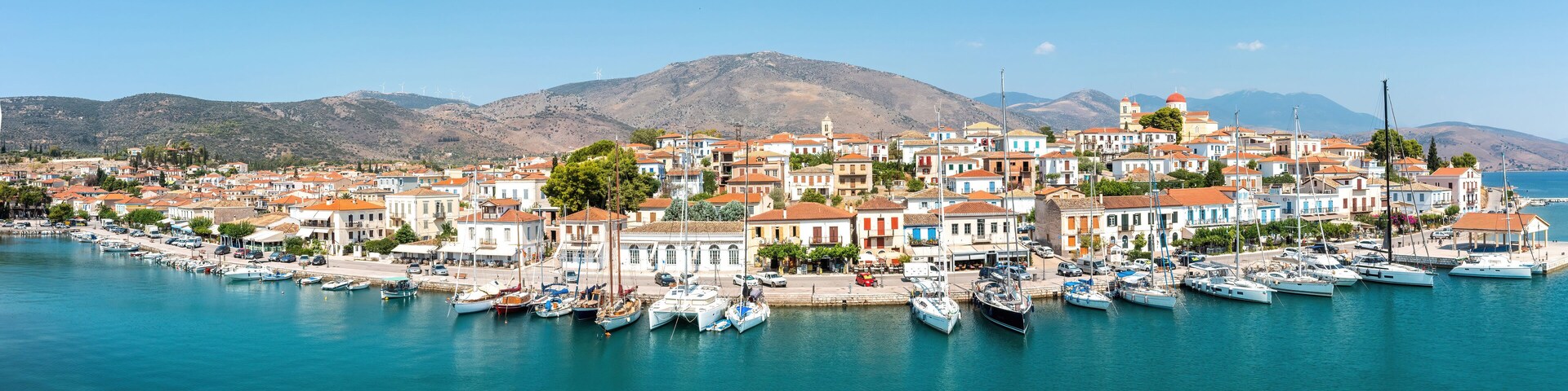 Galaxidi Greece from above, aerial drone view. Traditional town sunny day.