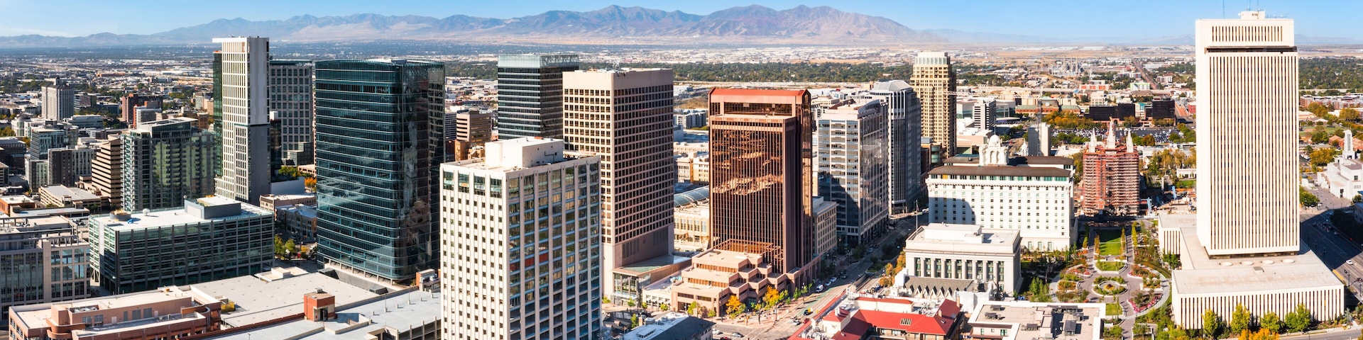 Aerial view of Salt Lake City, Utah skyline. SLC is the capital and most populous city of the U.S. state of Utah and the county seat of Salt Lake County