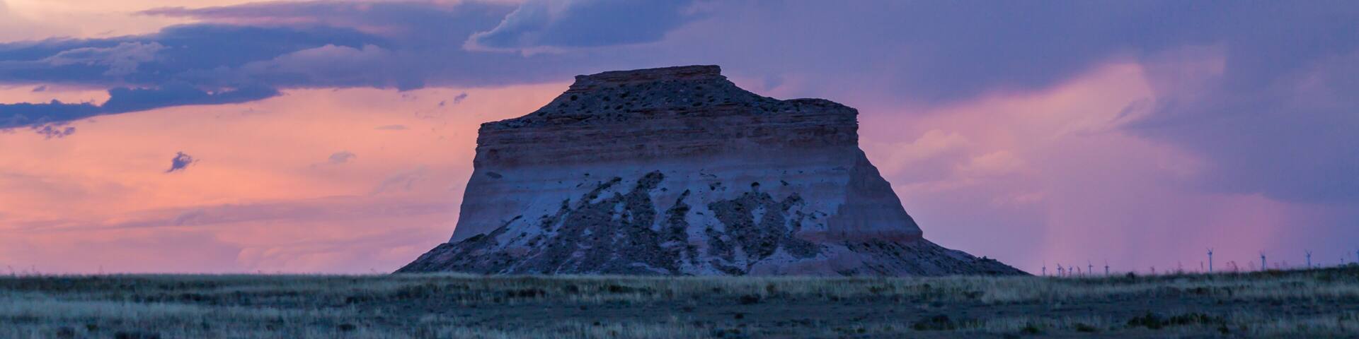 Storm Clouds gather over Pawnee Buttes in the Pawnee National Grassland on the Great Plains of northeastern Colorado at sunset in summer