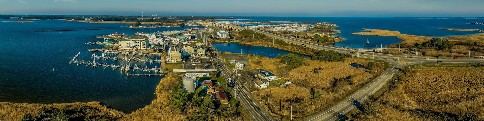 Aerial panorama of Kent Narrows earliest English settlement in Maryland, entrance to popular tourist spot Kent Island, marina, sail boats Queen Anne's County, fishing village on the Chesapeake