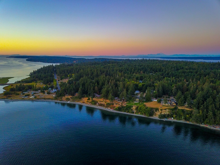 Out of the Olympic peninsula! Look at those colors!! #marrowstone #island #olympicpeninsula #washington #state #pnw #nature #drone #sunset #reflection #ocean