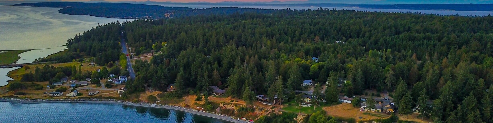 Out of the Olympic peninsula! Look at those colors!! #marrowstone #island #olympicpeninsula #washington #state #pnw #nature #drone #sunset #reflection #ocean