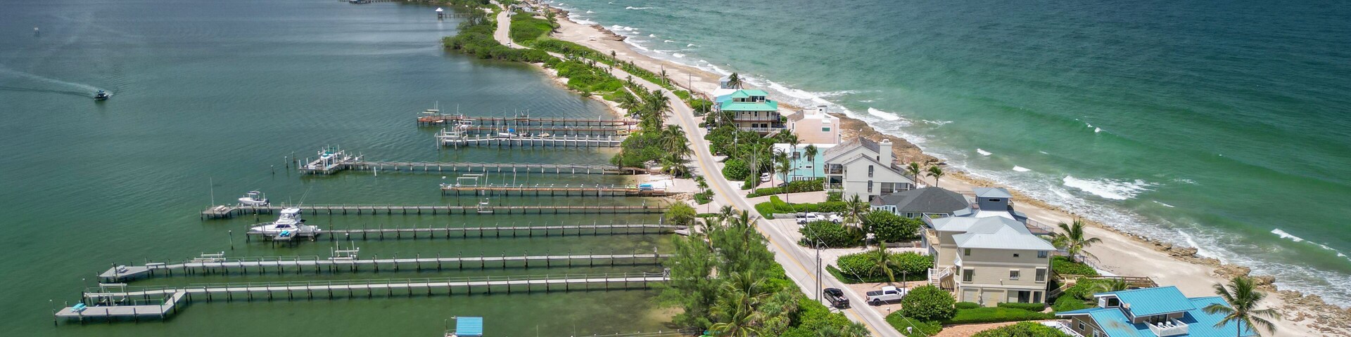 Aerial coastline view and river front houses at Stuart Rocks Beach in Stuart, Florida in Martin County