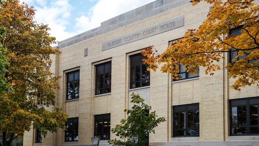The state courthouse for Gladwin County located in Gladwin, Michigan with fall leaves