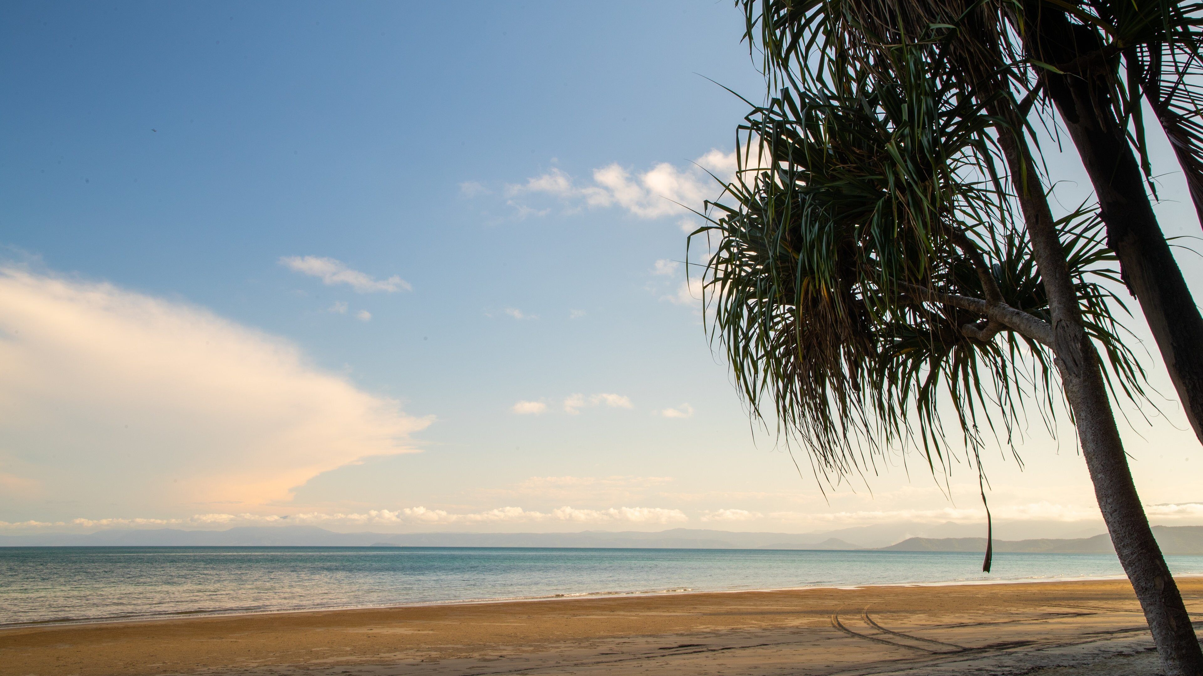 Cape Kimberley featuring a sunset, a beach and general coastal views