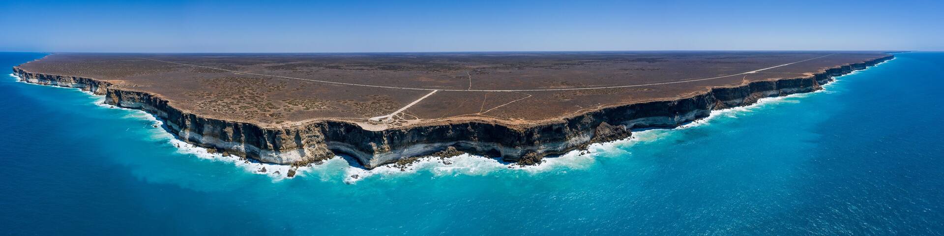 Panoramic view looking down on the sandstone cliffs and the Great Australian Bight marine park from an unidentified stop on the Eyre Highyway past Bunda Cliffs
