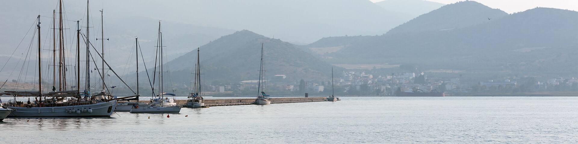 Panoramic shot of Sailing Boats in the harbour of Volos, at sunrise