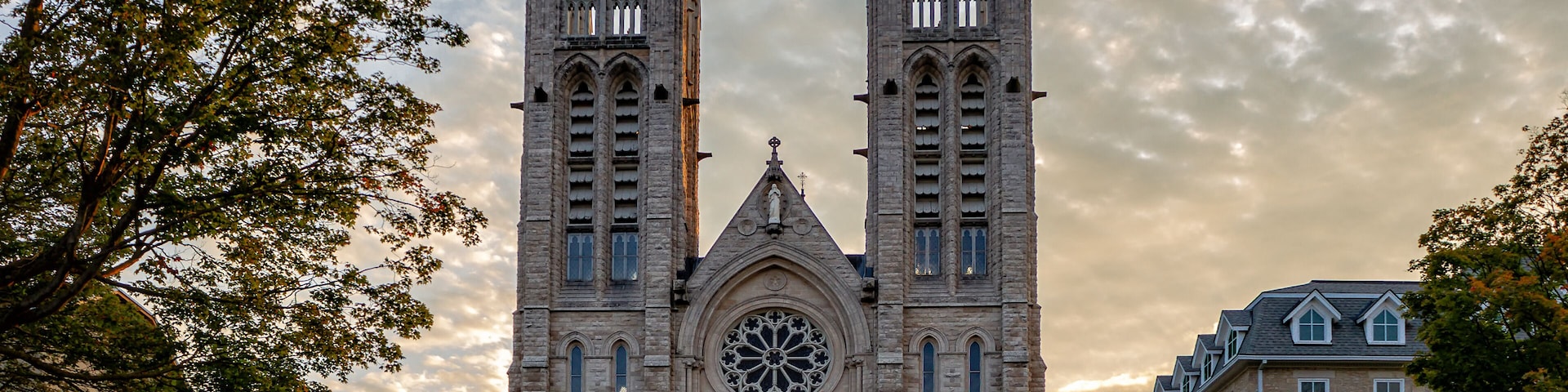 A Gothic-style cathedral with twin towers and a large rose window.